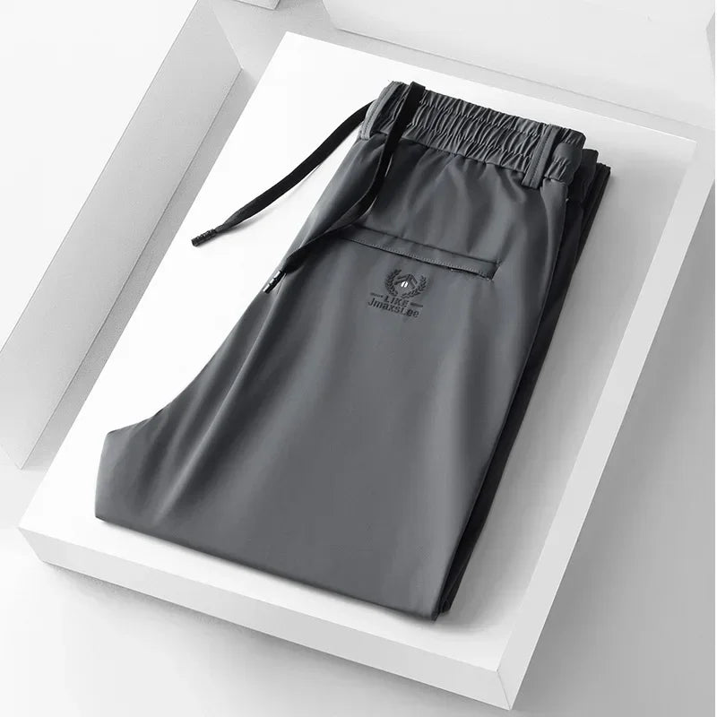 Vrijetijdsbroek voor heren met elastische tailleband en zak met rits