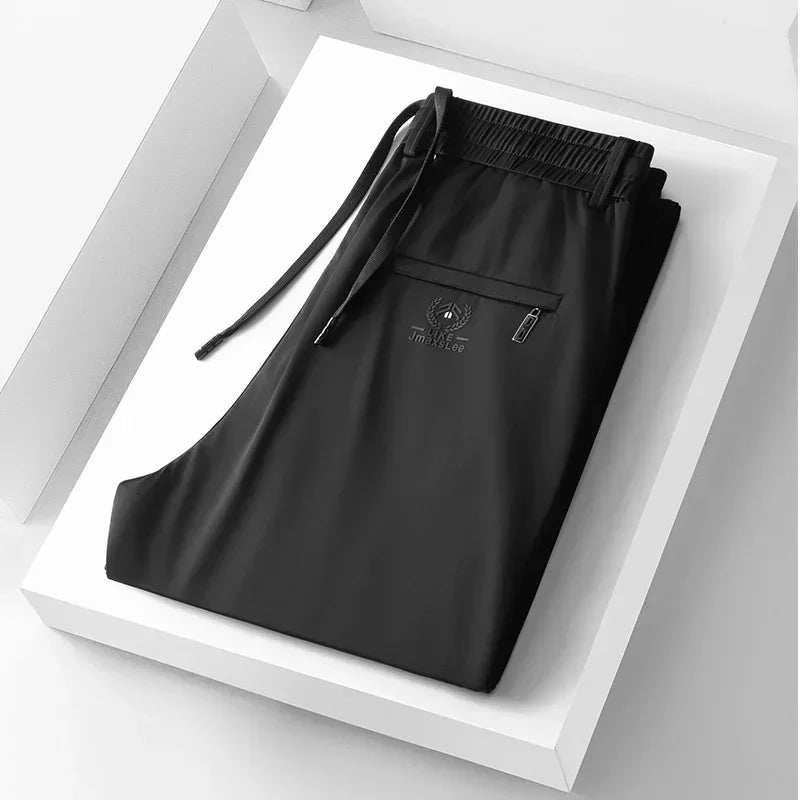 Vrijetijdsbroek voor heren met elastische tailleband en zak met rits