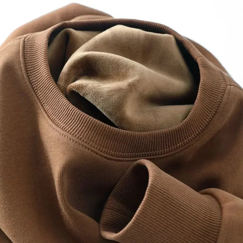 Unisex sweatshirt met lange mouwen, zachte binnenvoering, ronde hals en geribde boorden