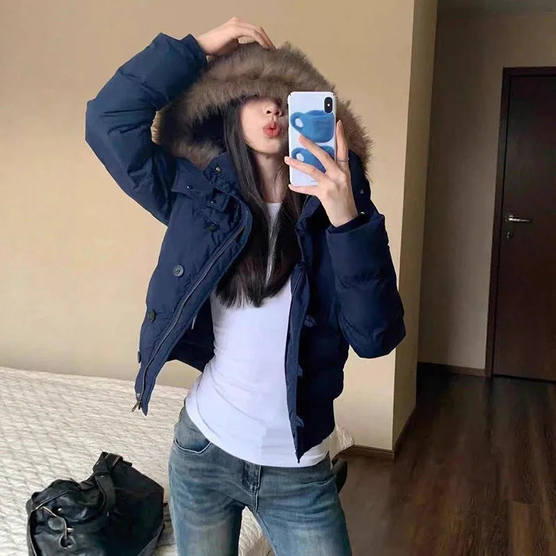 Kurze Damen Pufferjacke mit Kapuze und Kunstfellbesatz Rosa