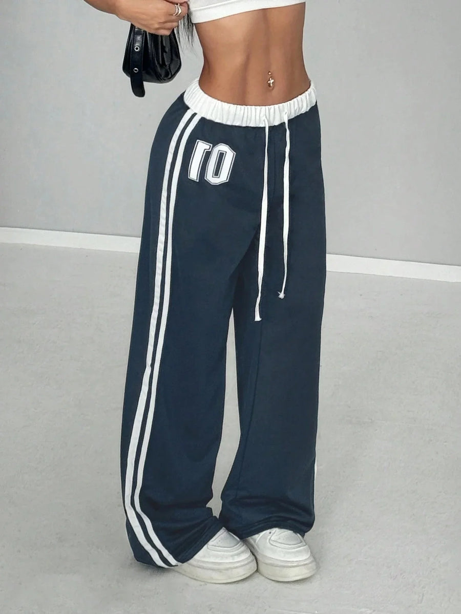 Wide-leg-joggingbroek voor dames met zijstrepen en cijferprint