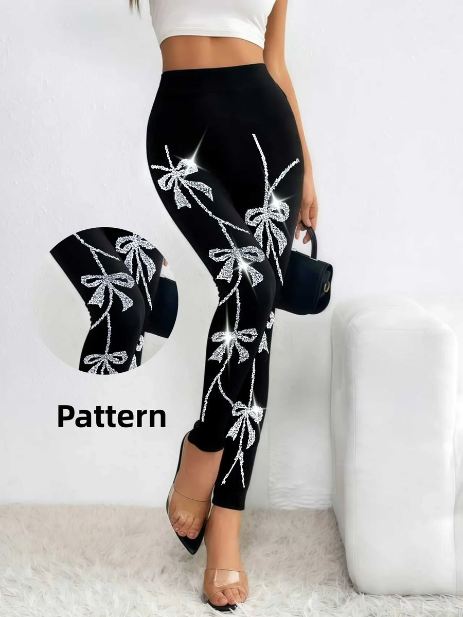 Damen Leggings Schwarz mit Glitzer-Schleifenmuster
