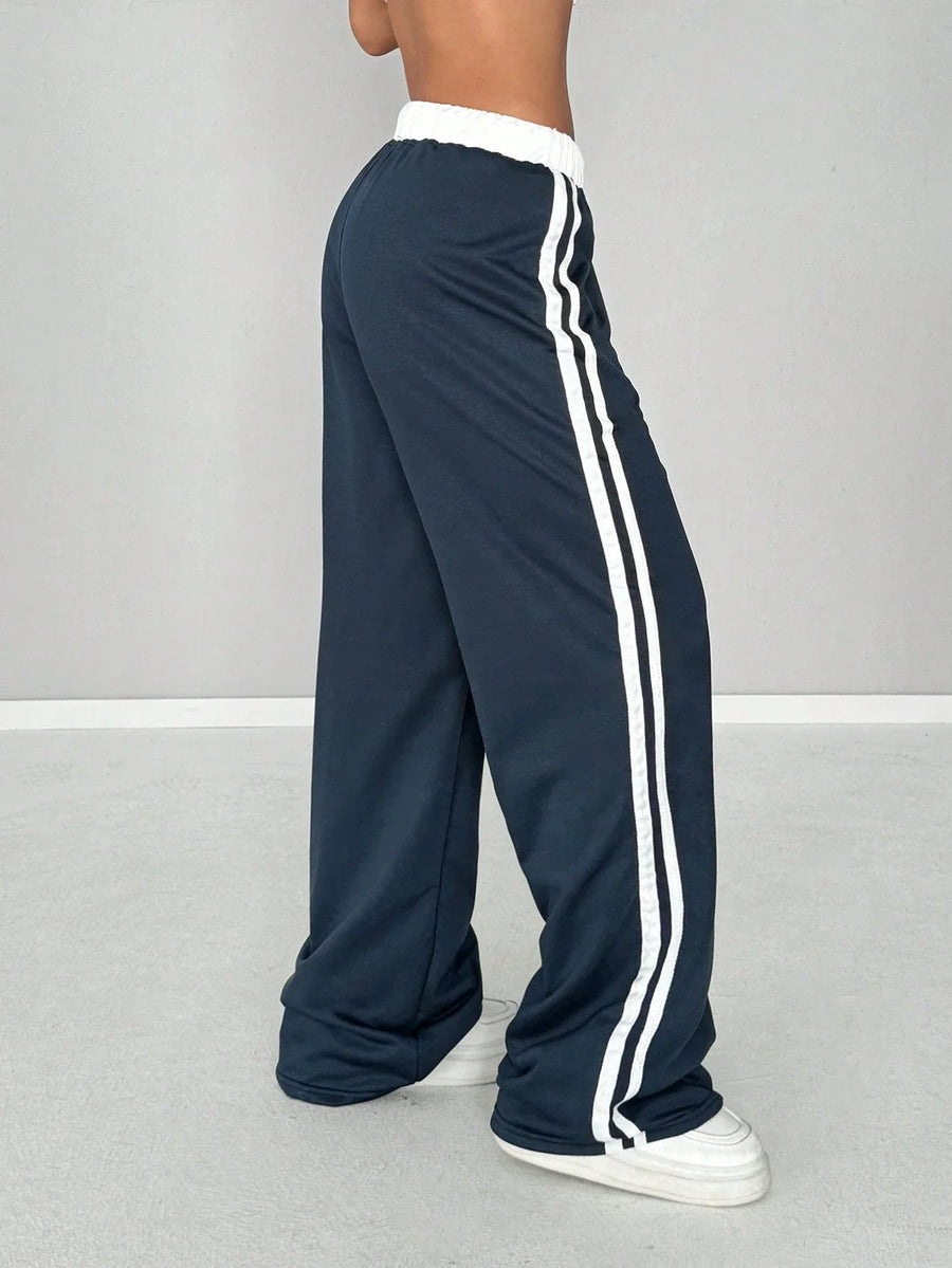 Wide-leg-joggingbroek voor dames met zijstrepen en cijferprint
