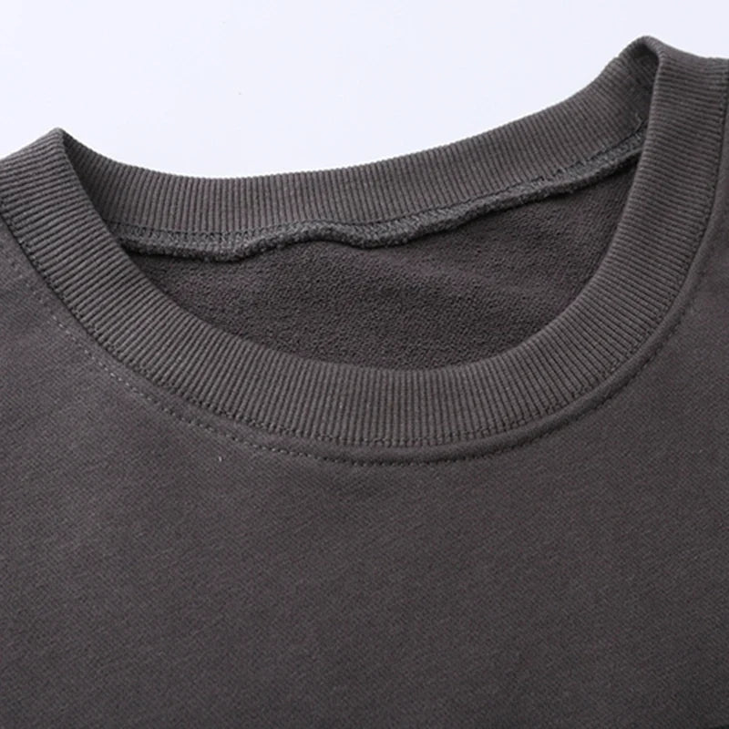 Uniseks sweatshirt met ronde hals en motiefprint