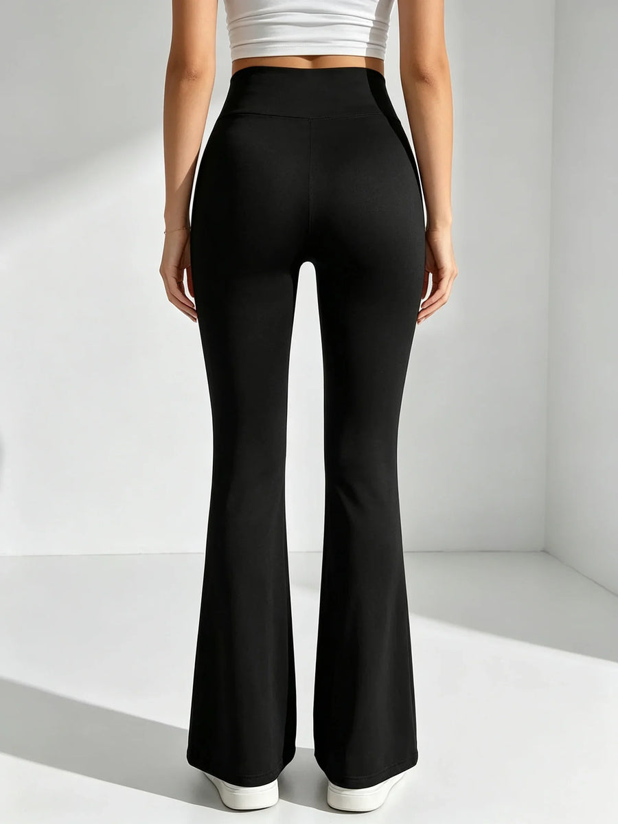 Zwarte dameslegging met uitlopende pijpen en hoge taille