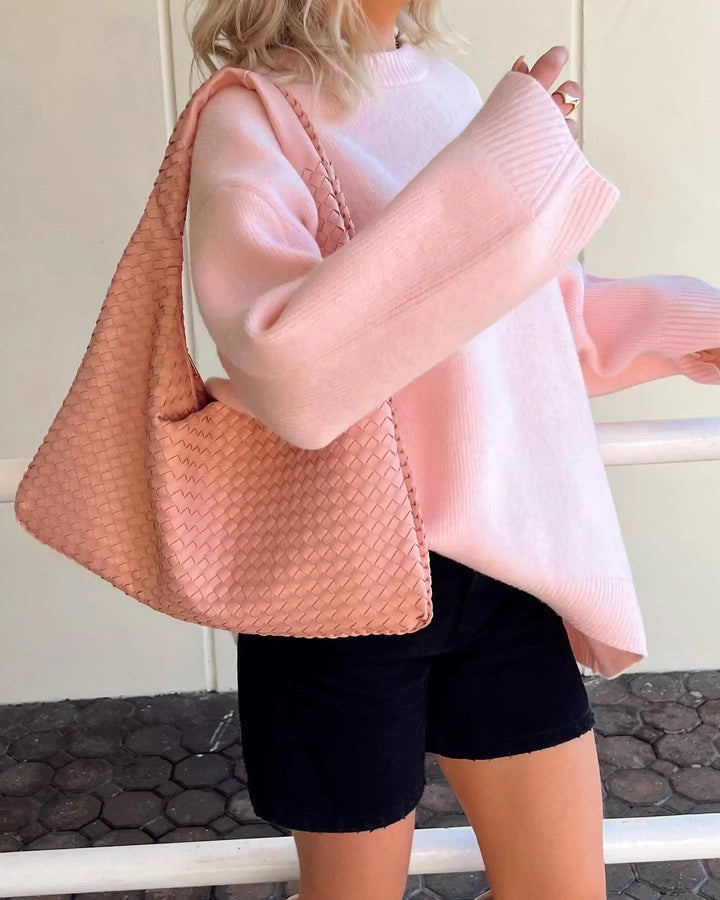 Roze oversized grofgebreide damestrui
