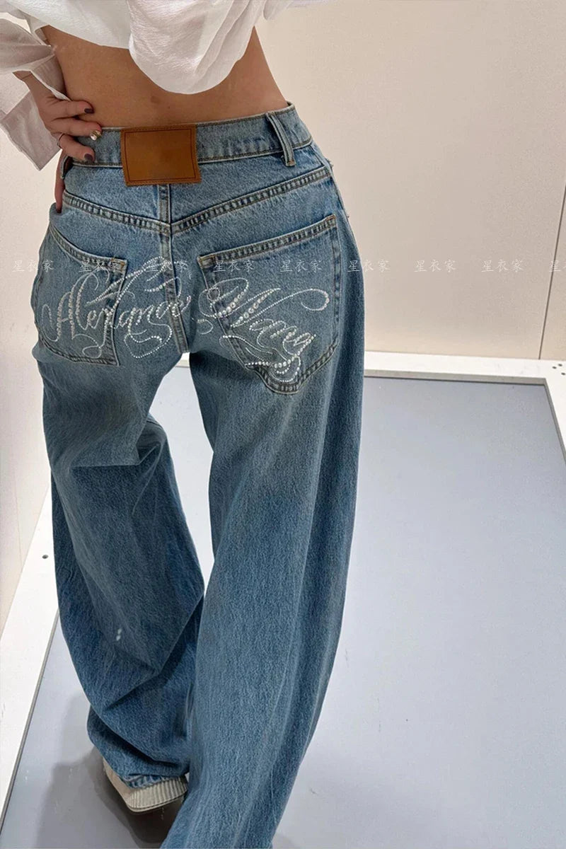 Damen Jeans Weites Bein Hellblau mit Verzierungen auf Gesäßtaschen