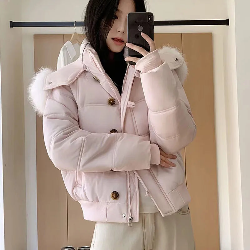 Kurze Damen Pufferjacke mit Kapuze und Kunstfellbesatz Rosa