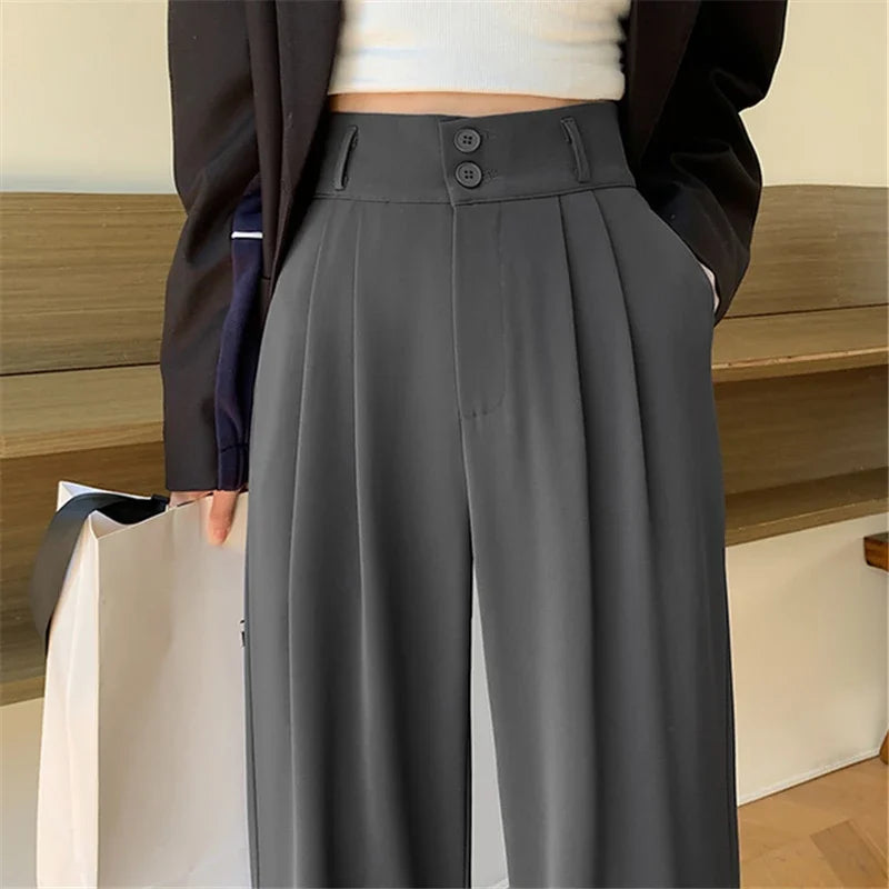 Wijde damesbroek met hoge taille, plooien en knoopsluiting