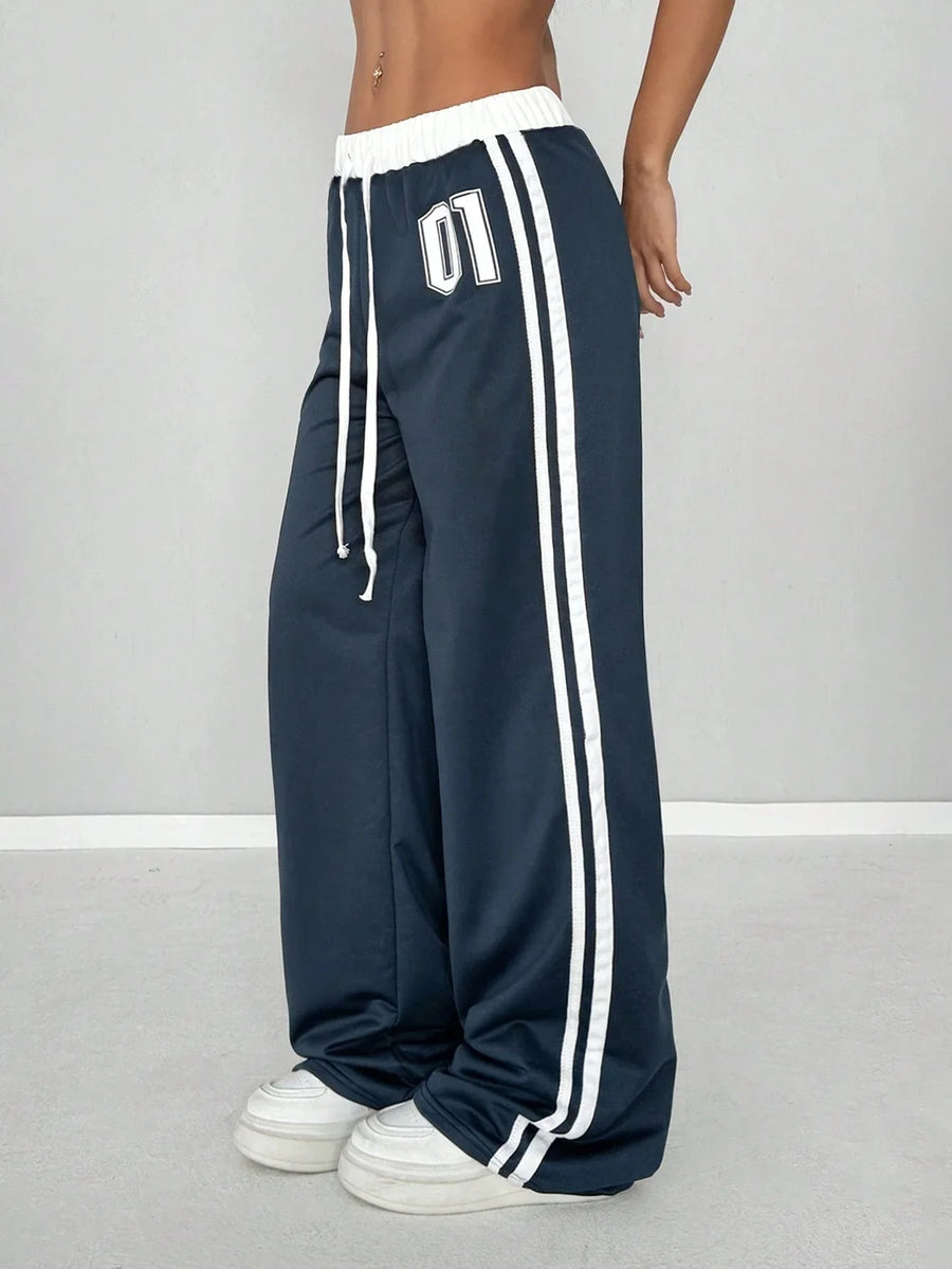 Wide-leg-joggingbroek voor dames met zijstrepen en cijferprint