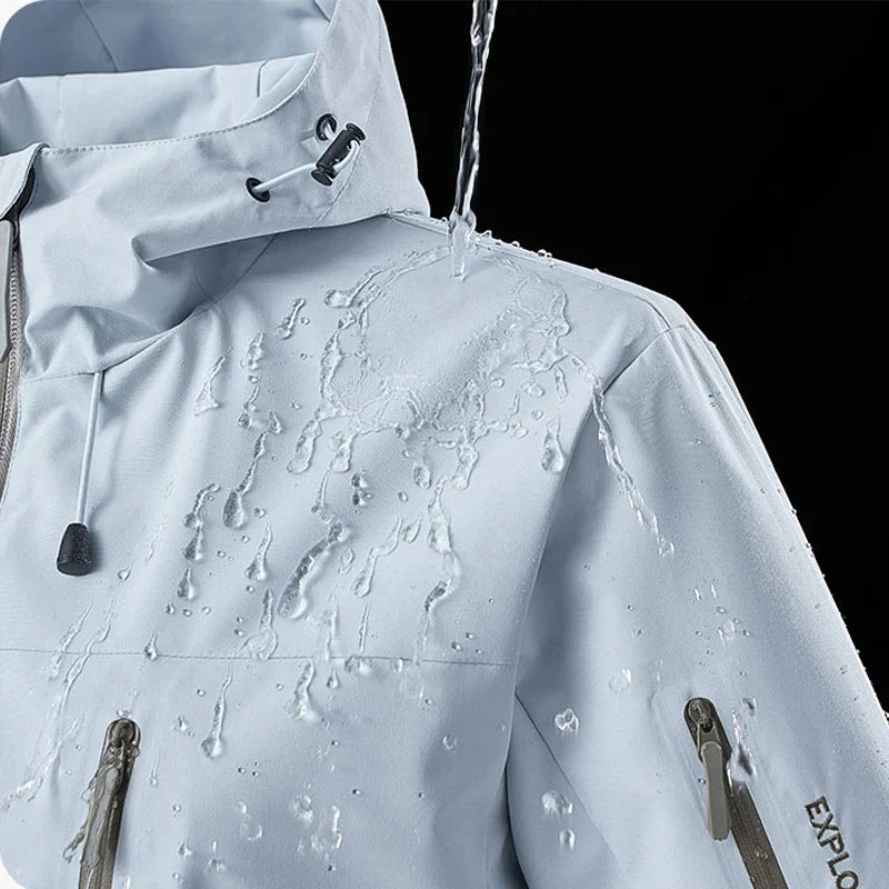 Unisex Outdoorjacke mit Kapuze, Reißverschlusstaschen und Kontrastdetails