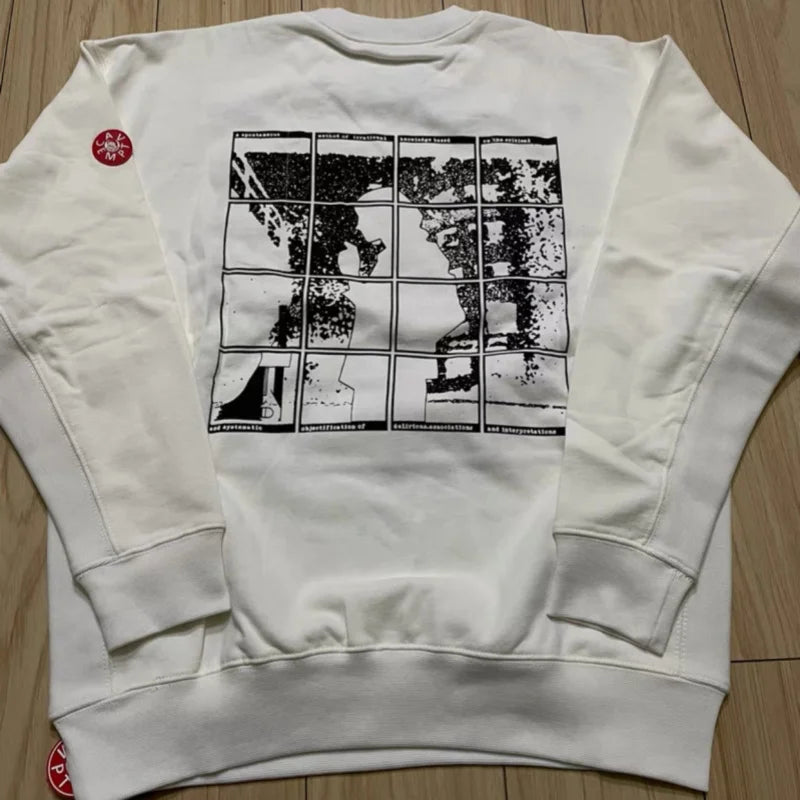 Uniseks sweatshirt met lange mouwen, ronde hals, grafische print en patch op de mouw