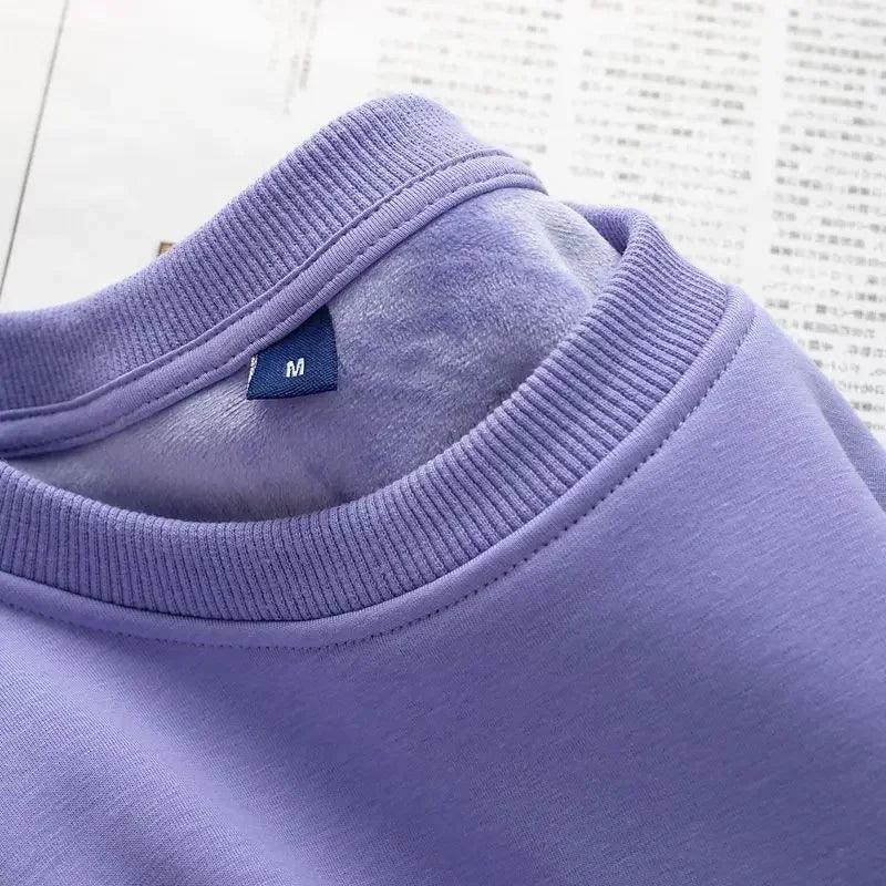 Unisex sweatshirt met lange mouwen, zachte binnenvoering, ronde hals en geribde boorden