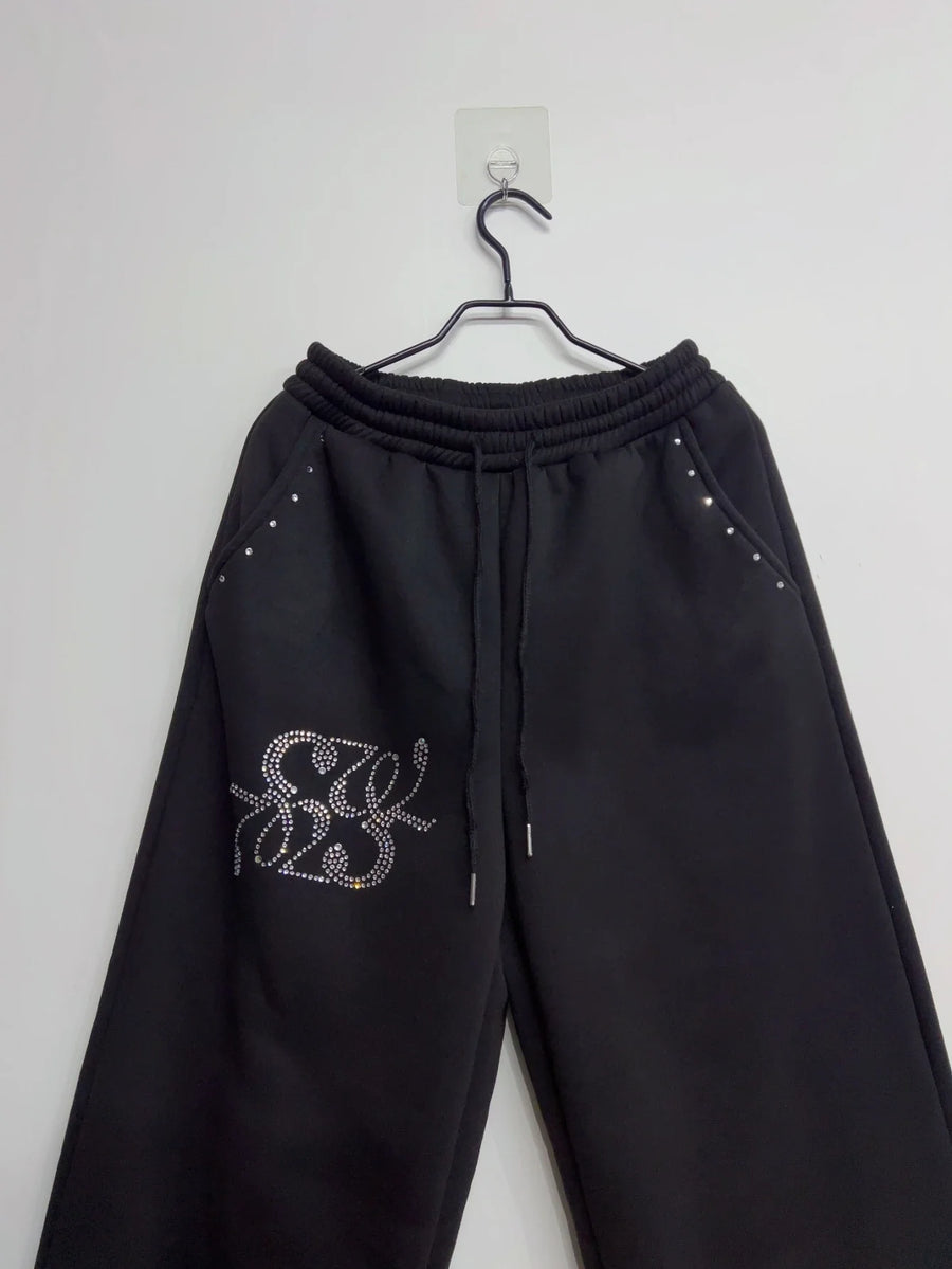 Zwarte wijde joggingbroek voor dames met glitterapplicatie