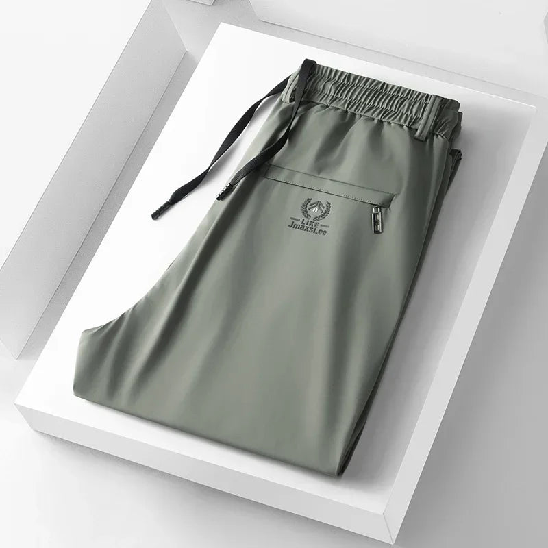 Vrijetijdsbroek voor heren met elastische tailleband en zak met rits