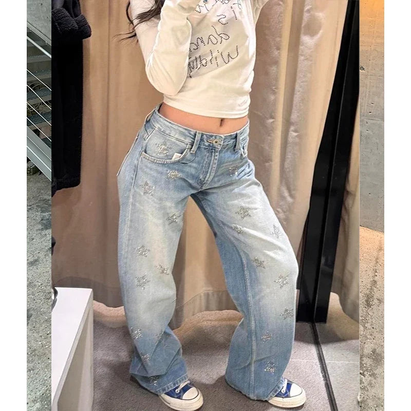 Lichtblauwe damesjeans met wijde pijpen, sterren, glitter en straight fit
