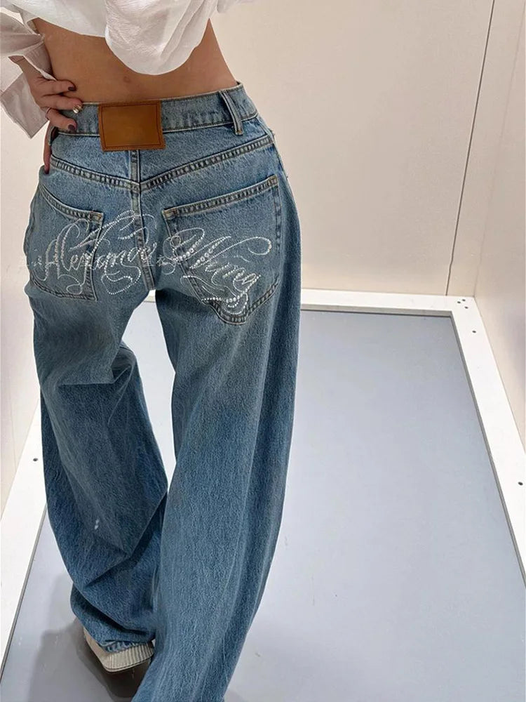 Damen Jeans Weites Bein Hellblau mit Verzierungen auf Gesäßtaschen