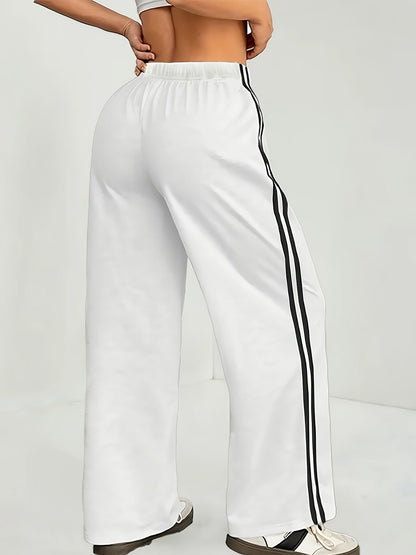 Damen Trainingshose mit weitem Bein und sportlichen Streifen – Lässiger Streetstyle