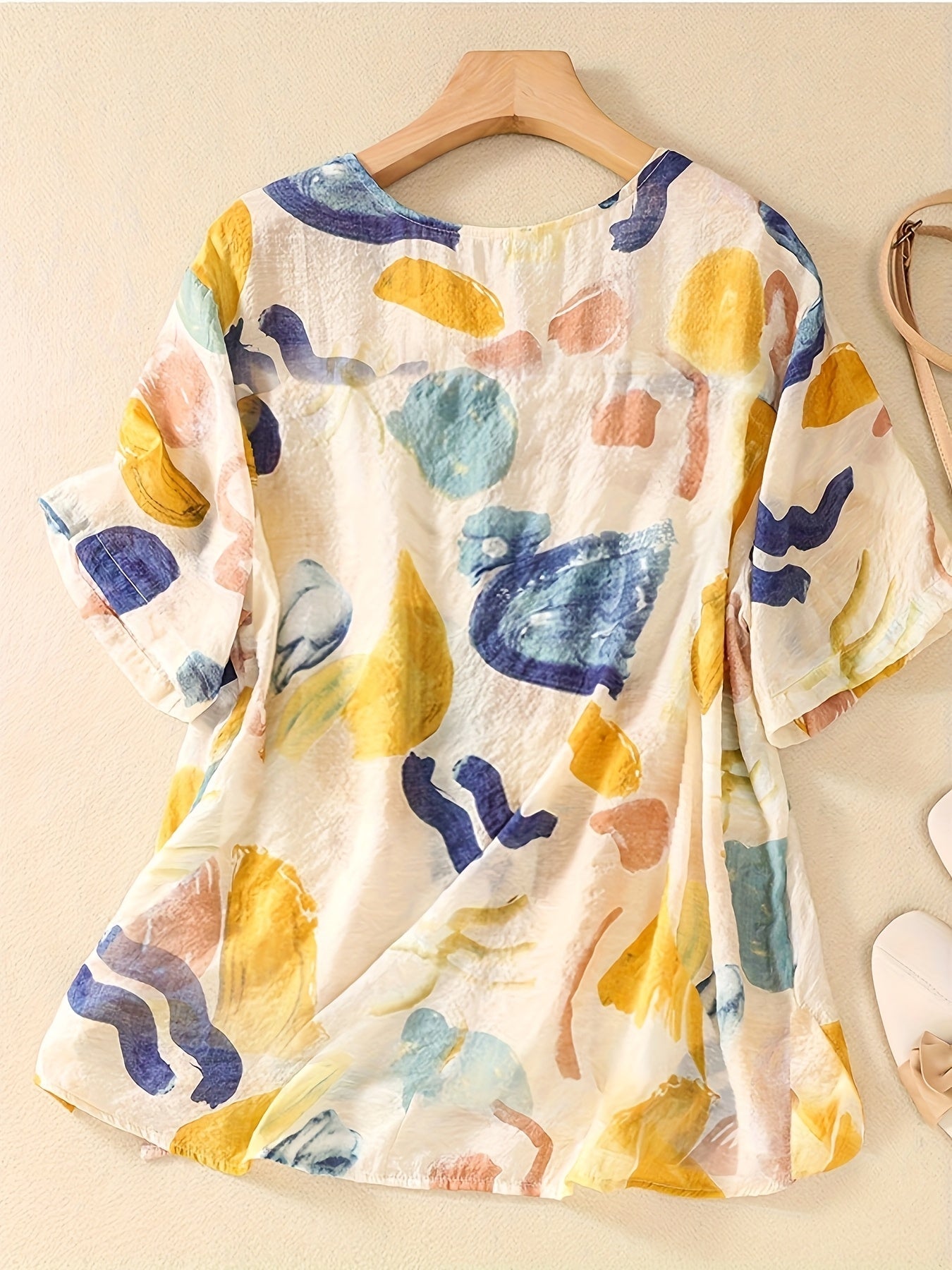 Damen Kurzarm-Bluse mit abstraktem Muster, lockerer Schnitt, modischer Freizeitstil