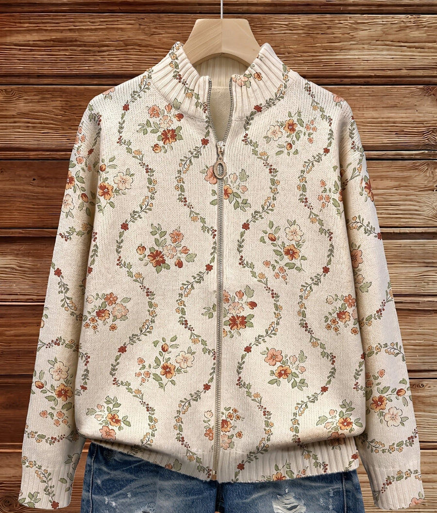 Beige damesvest met bloemenpatroon, ritssluiting en opstaande kraag